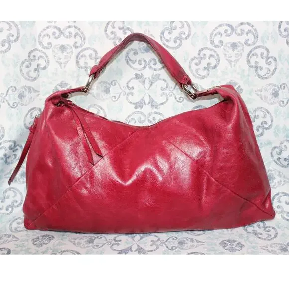 Elegant Raspberry Leather Handbag - Picture 1 of 10